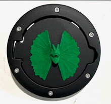 Load image into Gallery viewer, Dilophosarous in 3D - Black with Green Jeep Wrangler JK/JKU Flag Gas Cap Cover - I Believe UFO
